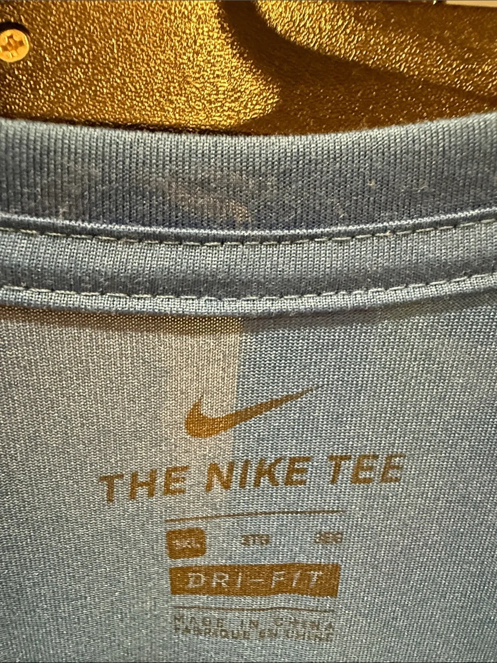 Nike Men's Royal Blue Short Sleeve Athletic Tee with Black Swoosh